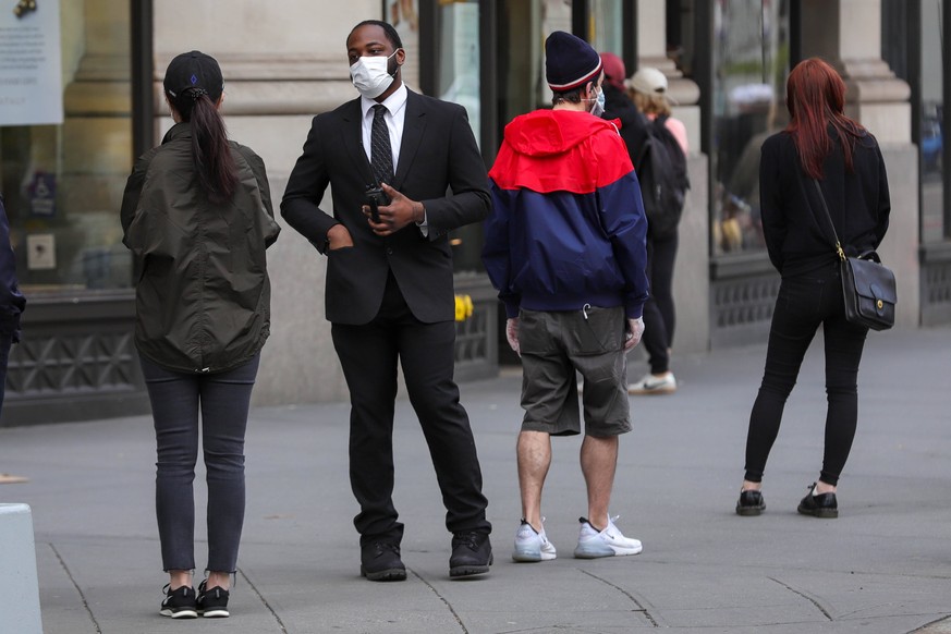 April 25, 2020, New York, New York, United States: People with a protective mask are seen on Fifth Avenue in the Flatiron District in Manhattan in New York City, USA. New York City is the epicenter of ...
