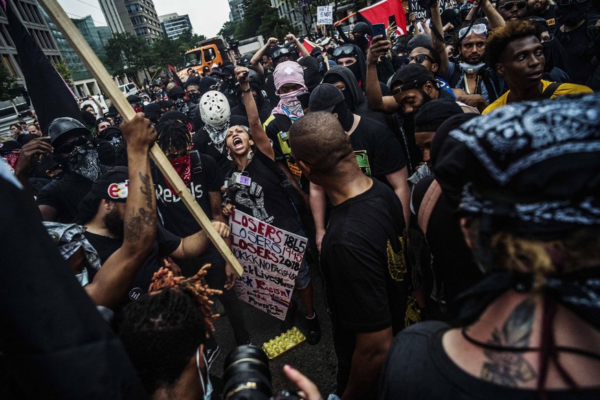 August 12, 2018 - Washington, District of Columbia, U.S. - Black Lives Matter protesters voiced their displeasure at the presence of Unite the Right rally. At the Unite the Right rally in Washington D ...