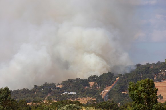 PERTH, AUSTRALIA - FEBRUARY 03: A bush fire is seen threatening Avon Ridge in Brigadoon on February 03, 2021 in Perth, Australia. The Rapid Damage assessment team have identified 71 homes have been lo ...