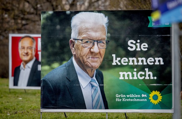 Election posters show Winfried Kretschmann from the Greens and the party's top candidate for the Baden-Wurttemberg federal state elections in Mannheim, Germany, Wednesday, March 10, 2021. The election ...