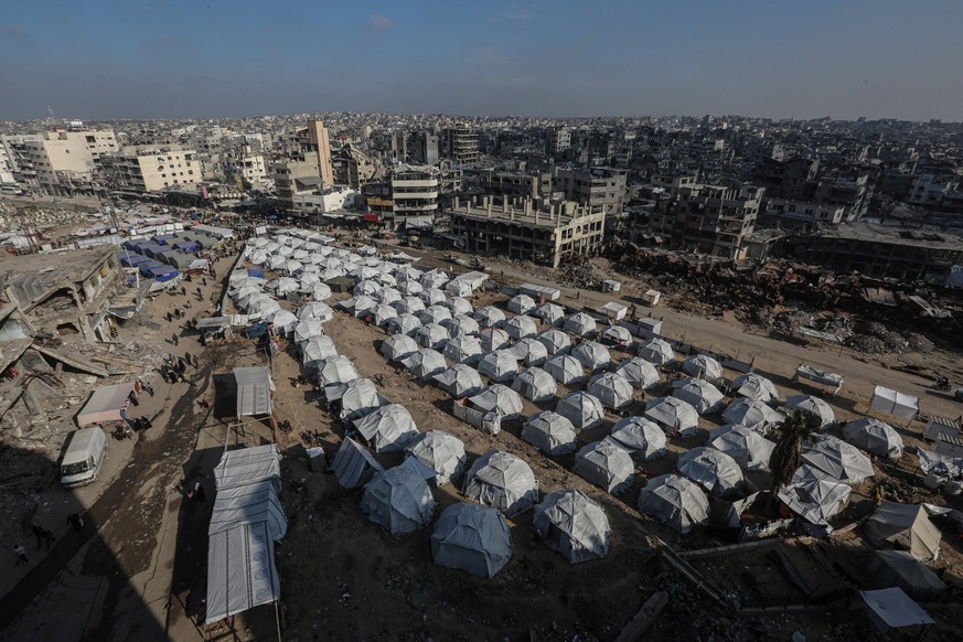 Newly erected tents are spread in Al-Shujiyya neighbourhood in Gaza City Newly erected tents are spread in Al-Shujiyya neighbourhood in Gaza City, on February 04, 2025, as displaced Palestinians retur ...