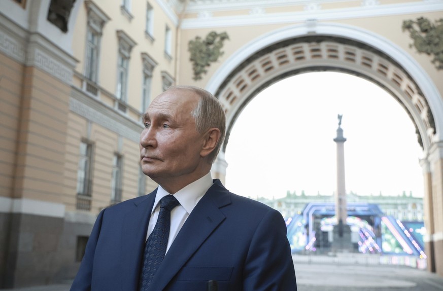 Russian President Vladimir Putin answers to a journalists&#039;s question after a plenary session of the St. Petersburg International United Cultures Forum in St. Petersburg, Russia, Thursday, Sept. 1 ...