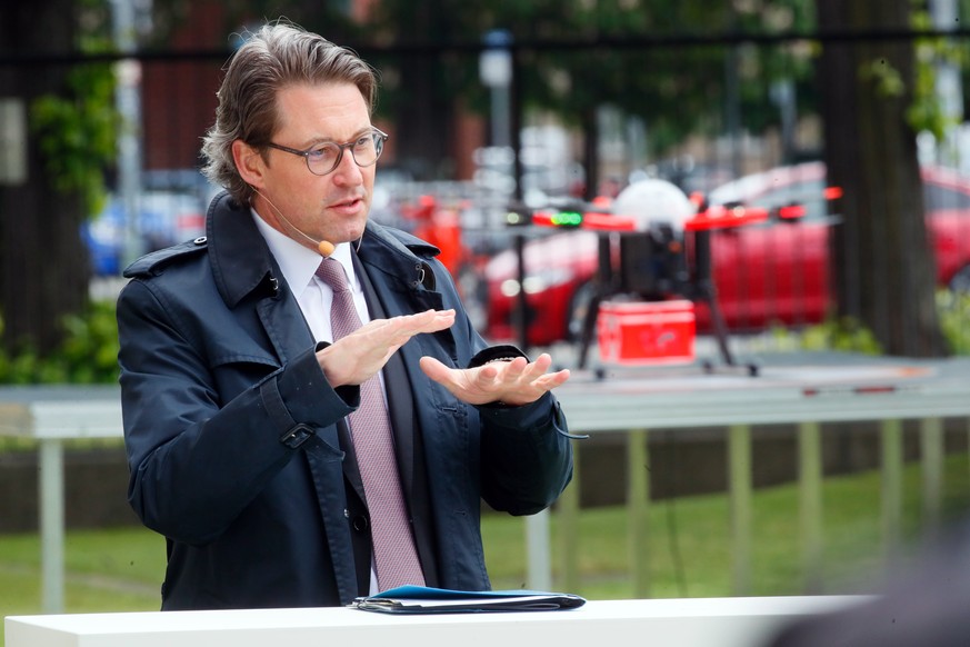 German Transport Minister Andreas Scheuer speaks during the presentation of a medical transport drone, amid the spread of the coronavirus disease (COVID-19) in Berlin, Germany, May 13, 2020. REUTERS/H ...