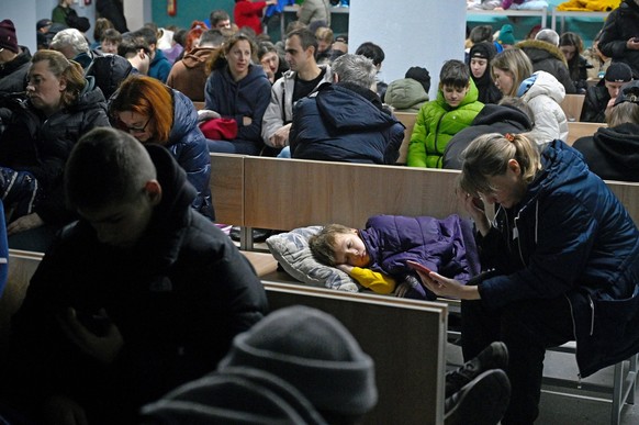 Aftermath of massive Russian missile and drone attack in Kyiv A child sleeps on a bench in a bomb shelter during an air alert caused by a large-scale Russian missile and drone attack in Kyiv, Ukraine, ...