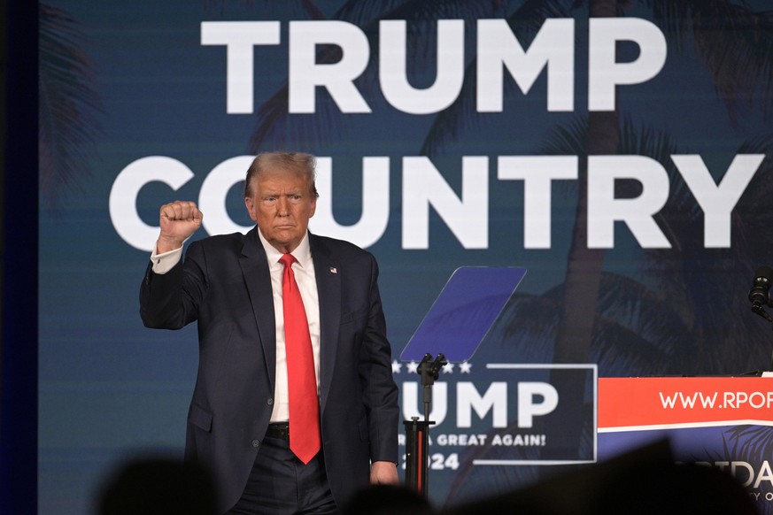 Former President Donald Trump acknowledges attendees after speaking at the Republican Party of Florida Freedom Summit, Saturday, Nov. 4, 2023, in Kissimmee, Fla. (AP Photo/Phelan M. Ebenhack)