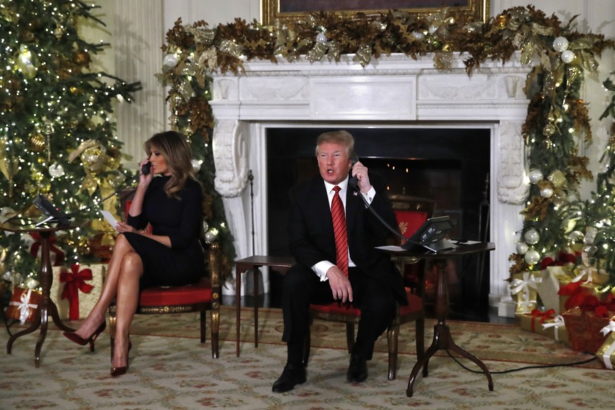 President Donald Trump answers a question about the shutdown saying, “Nothing new on the shutdown. We need more border security,” in answer to a reporter's question as he and first lady Melania Trump  ...