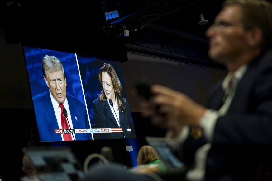 Journalists work in the spin room during the ABC Presidential Debate between Democratic presidential nominee and Vice President Kamala Harris and Republican presidential candidate, former U.S. Preside ...