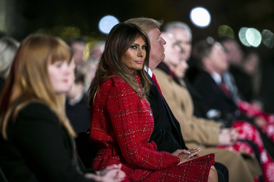 U.S. President Donald Trump and first lady Melania Trump watch the lighting ceremony for the 2017 National Christmas Tree on the Ellipse near the White House, on November 30, 2017 in Washington, D.C.  ...