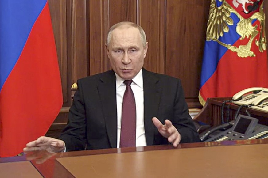 FILE - In this image made from video released by the Russian Presidential Press Service, Russian President Vladimir Putin addressees the nation in Moscow, Russia, Thursday, Feb. 24, 2022. Putin has ar ...