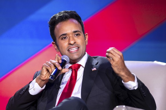 Republican presidential candidate Vivek Ramaswamy speaks at The Gathering conservative political conference in Buckhead, Ga., on Saturday, Aug. 19, 2023. (Arvin Temkar/Atlanta Journal-Constitution via ...