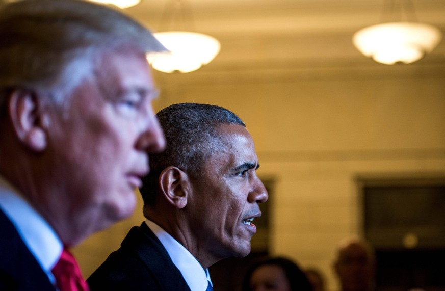 January 20, 2017 - Washington, United States - U.S. President Donald Trump and former President Barack Obama head toward the east steps at the U.S. Capitol for the departure ceremony during the 58th P ...