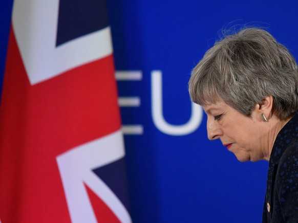 Britain's Prime Minister Theresa May leaves after giving a news briefing in Brussels, Belgium March 22, 2019. REUTERS/Toby Melville