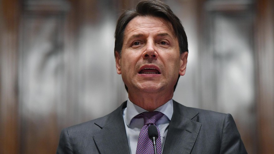 Premier-designate Giuseppe Conte addresses the media after a round of consultations to form the Cabinet ministers, in Rome, Thursday, May 24, 2018. Italy's premier-designate Giuseppe Conte spent his f ...