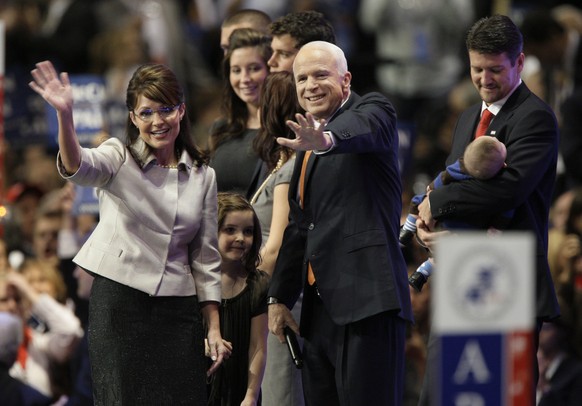 FILE - In this Sept. 3, 2008, file photo, Republican presidential candidate John McCain, center, joins vice presidential candidate Sarah Palin, left, and her family following her speech at the Republi ...