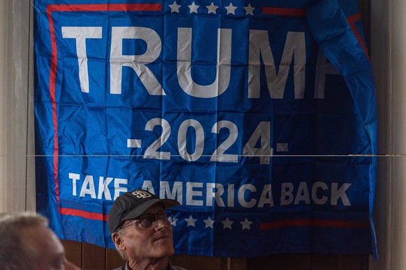 November 6, 2024, Bangkok, Thailand: A supporter of the Republican Party seen watching the broadcasting of the U.S. election results at the restaurant in Bangkok. Voters across the US cast ballots on  ...