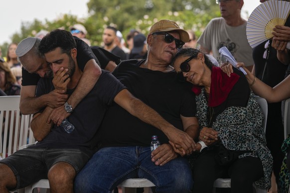 Mourners attend the funeral of May Naim, 24, during her funeral in Gan Haim, central Israel, Wednesday, Oct. 11, 2023. Naim and at least 260 more Israelis were killed by Hamas militants on Saturday at ...