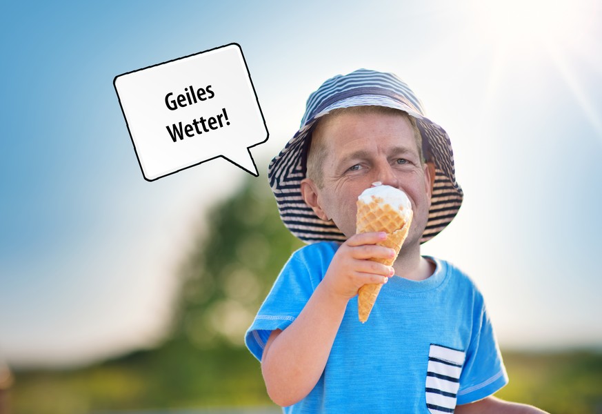 Happy child eating ice cream outdoors in summer. Portrait of a boy in sunglasses on sunny day