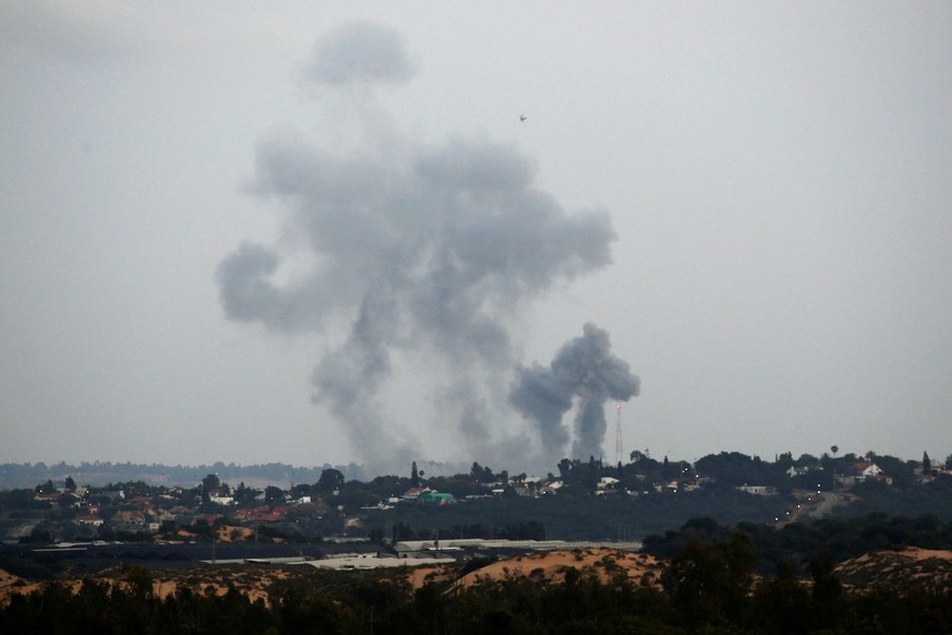 Smoke rises following an Israeli air strike on the Gaza Strip, as seen from the Israeli side of the border, May 12, 2018. REUTERS/Amir Cohen