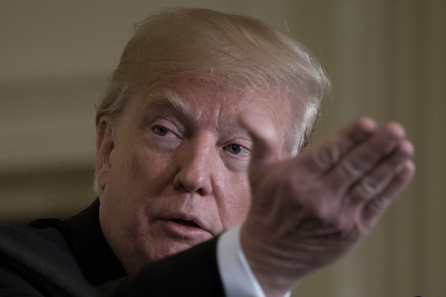 President Donald Trump speaks at a news conference with leaders of Baltic states in the East Room of the White House in Washington, Tuesday, April 3, 2018. Trump is pointing to a 50 percent job approv ...