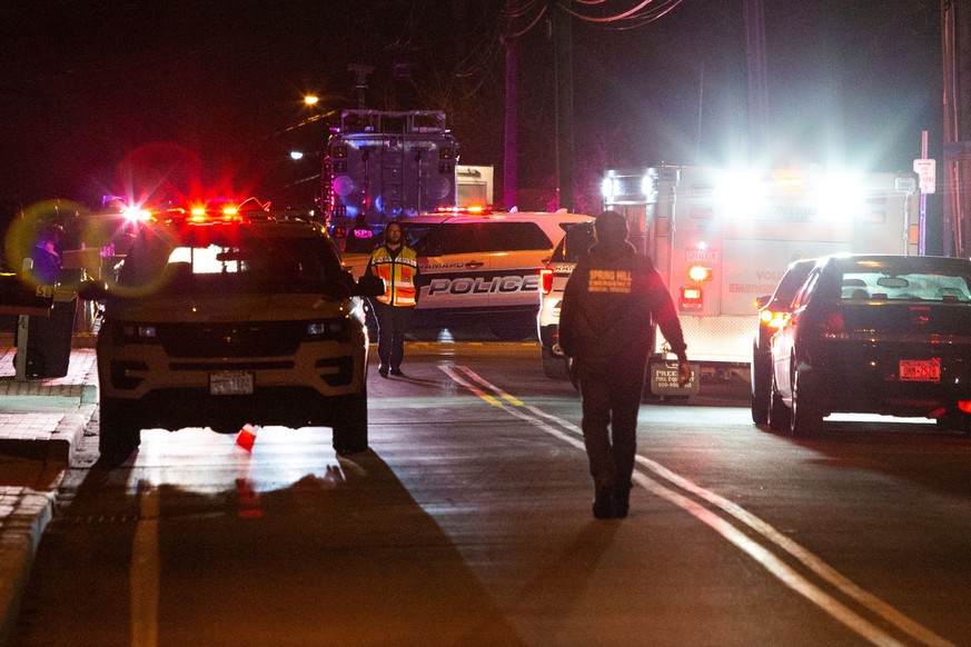 First responders walk the area where 5 people were stabbed at a Hasidic rabbi's home in Monsey, New York, U.S., December 29, 2019. REUTERS/Eduardo Munoz