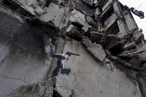 Banksy Graffiti Appeared On Several Destroyed Buildings In The Kyiv Region Graffiti in the city of Borodyanka, Ukraine, on November 12, 2022. In the cities of the Kyiv region affected by the Russian a ...